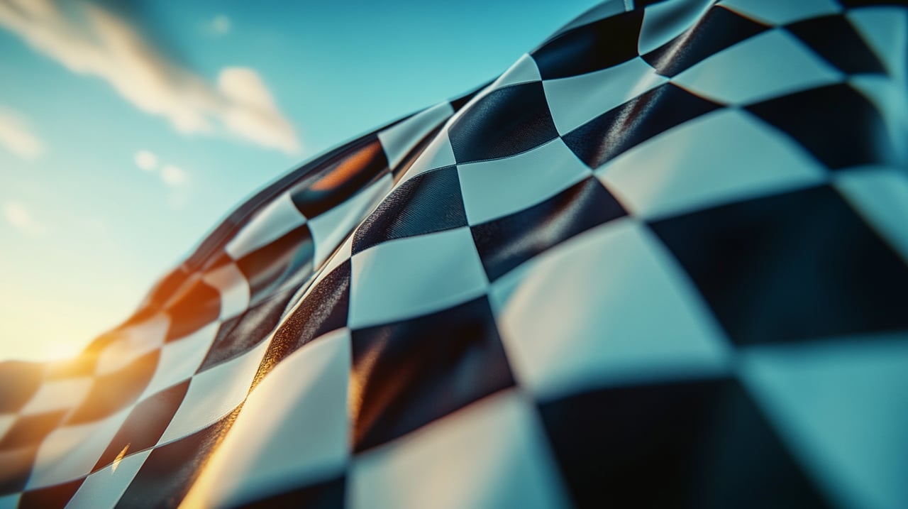 tlhfckoctbcr_checkered_race_flag_beautiful_day_blowing_in_the_w_cbc420e5-8853-4a41-97cd-72c170963adc